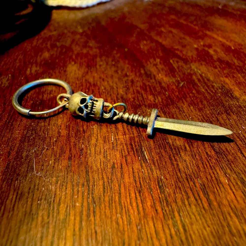 Punk/metal skull and dagger earring